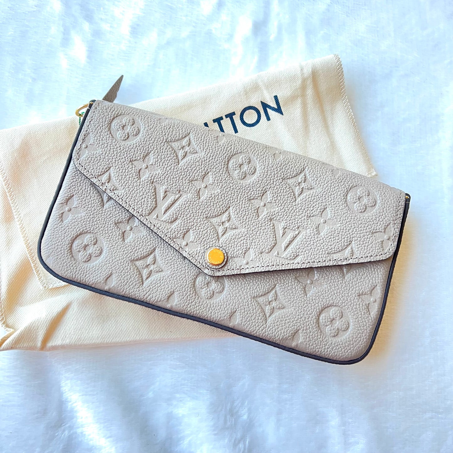LOUIS VUITTON Turtledove Empreinte Felice Pochette