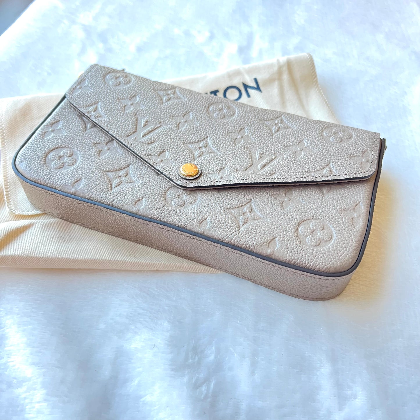 LOUIS VUITTON Turtledove Empreinte Felice Pochette