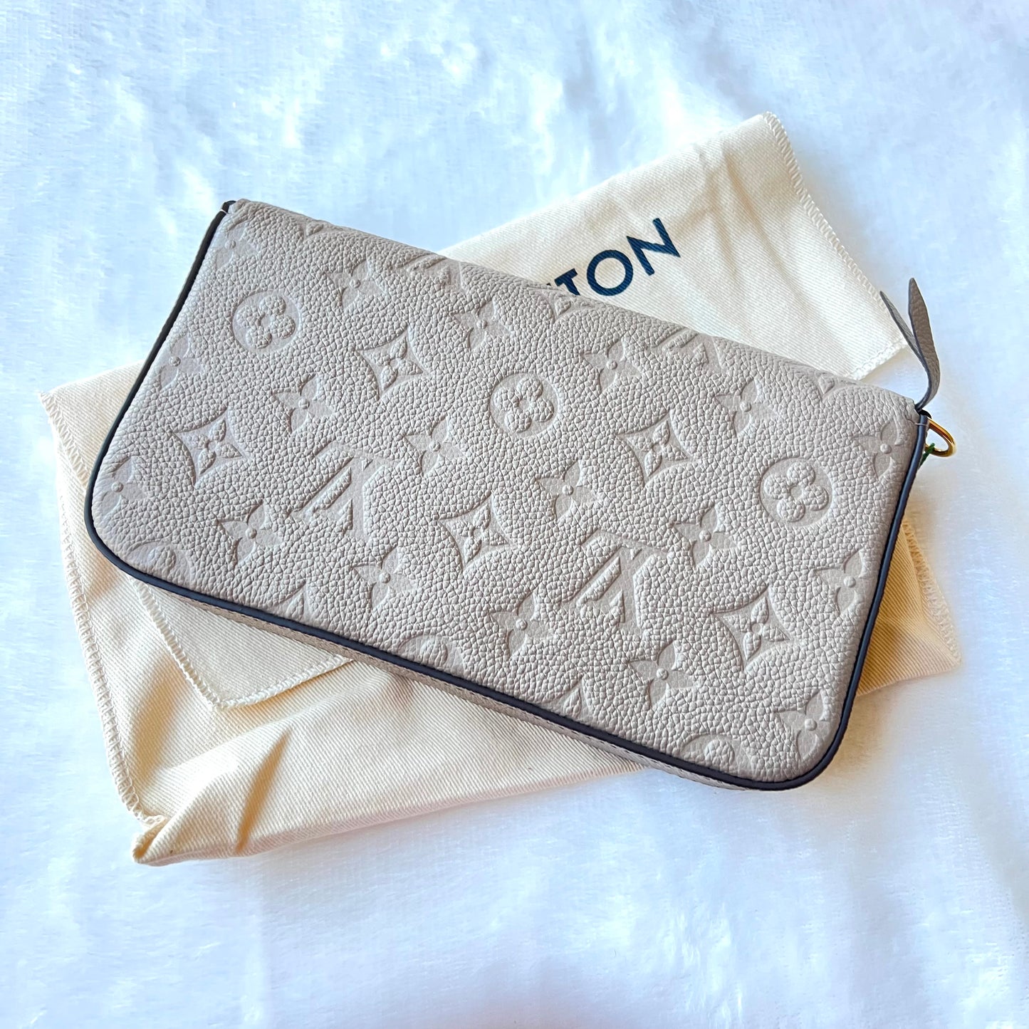 LOUIS VUITTON Turtledove Empreinte Felice Pochette