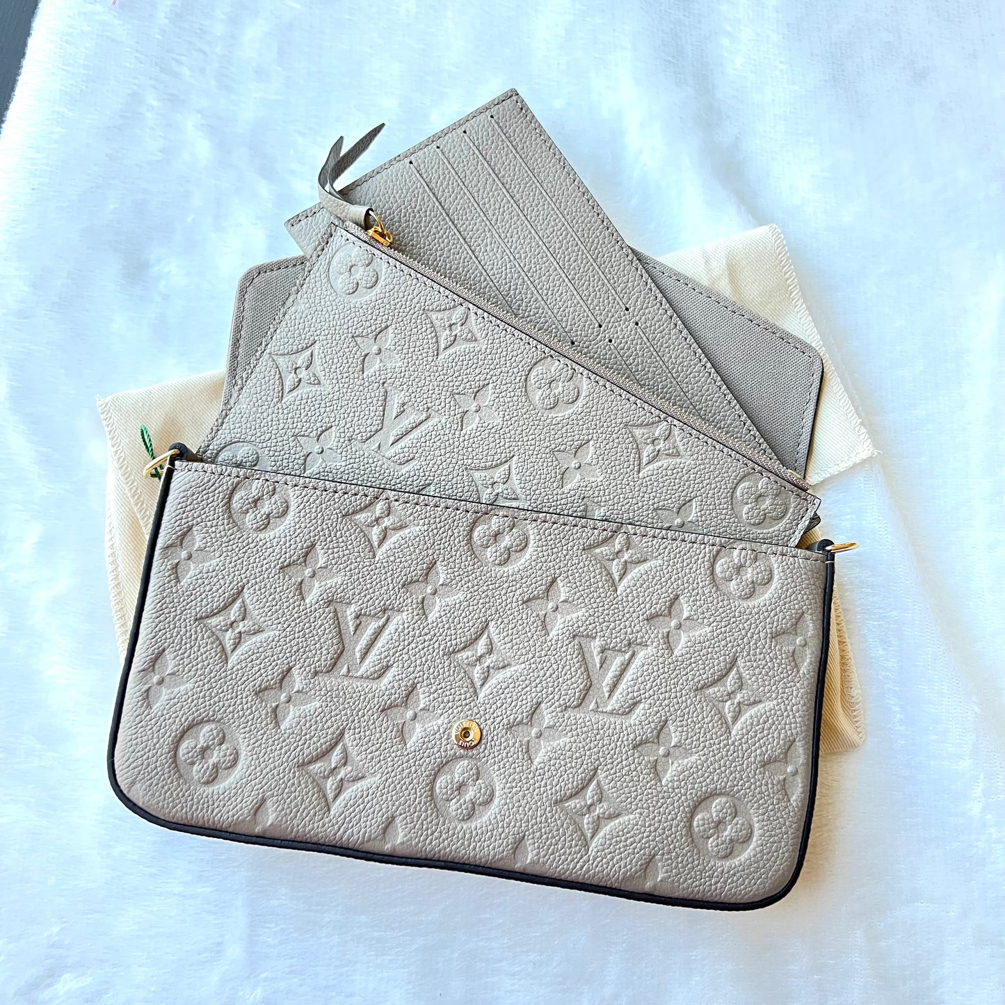 LOUIS VUITTON Turtledove Empreinte Felice Pochette