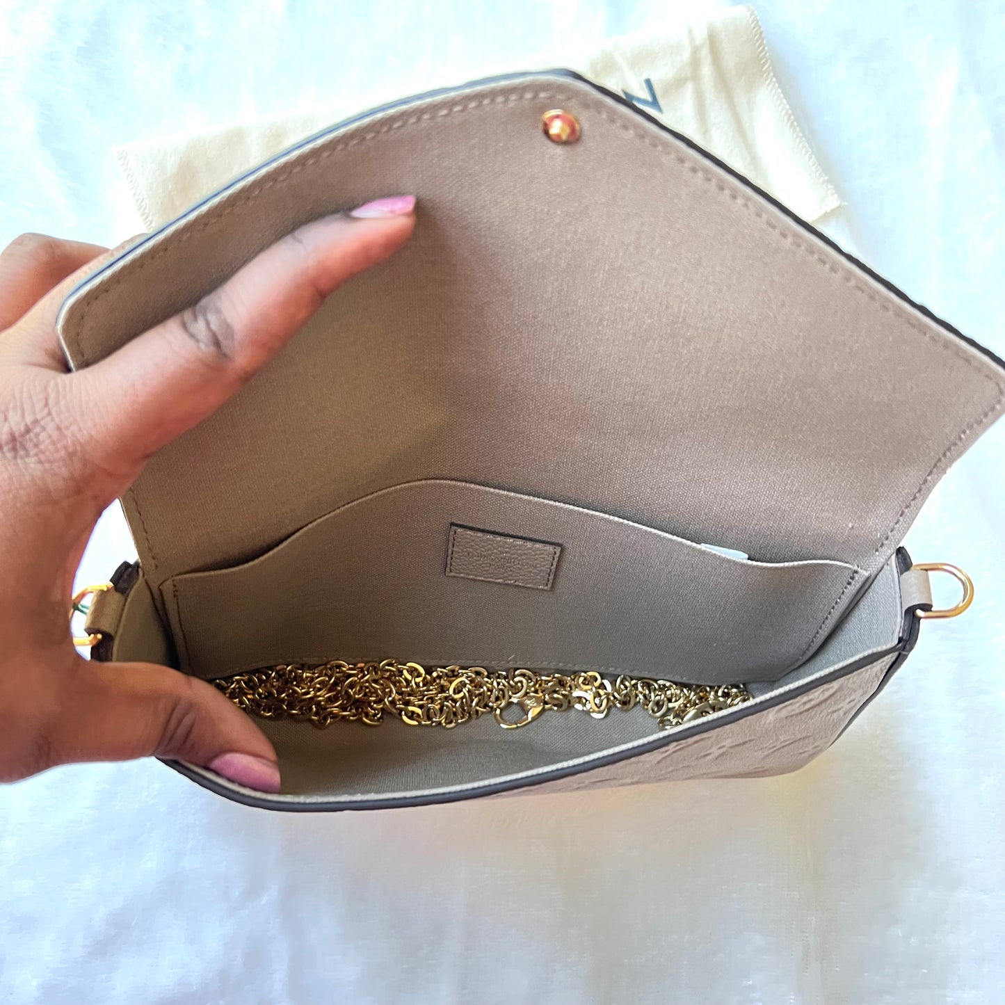 LOUIS VUITTON Turtledove Empreinte Felice Pochette