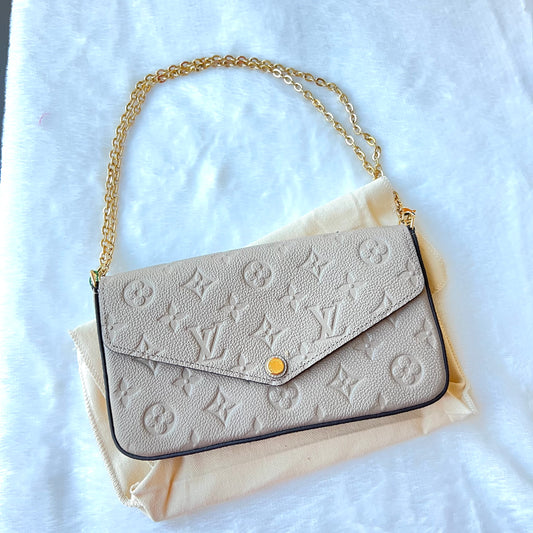 LOUIS VUITTON Turtledove Empreinte Felice Pochette