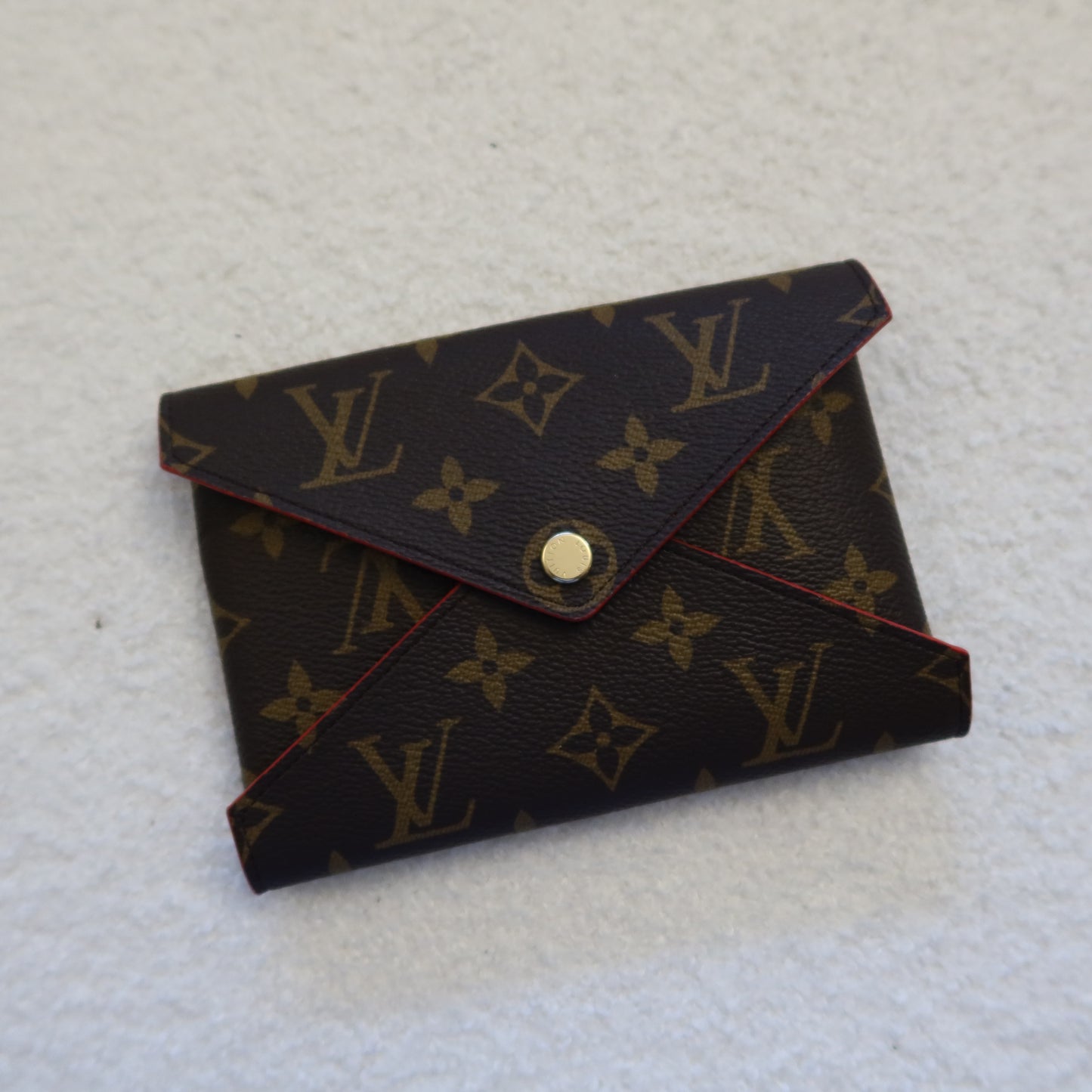 LOUIS VUITTON Monogram Kirigami Pochette Medium
